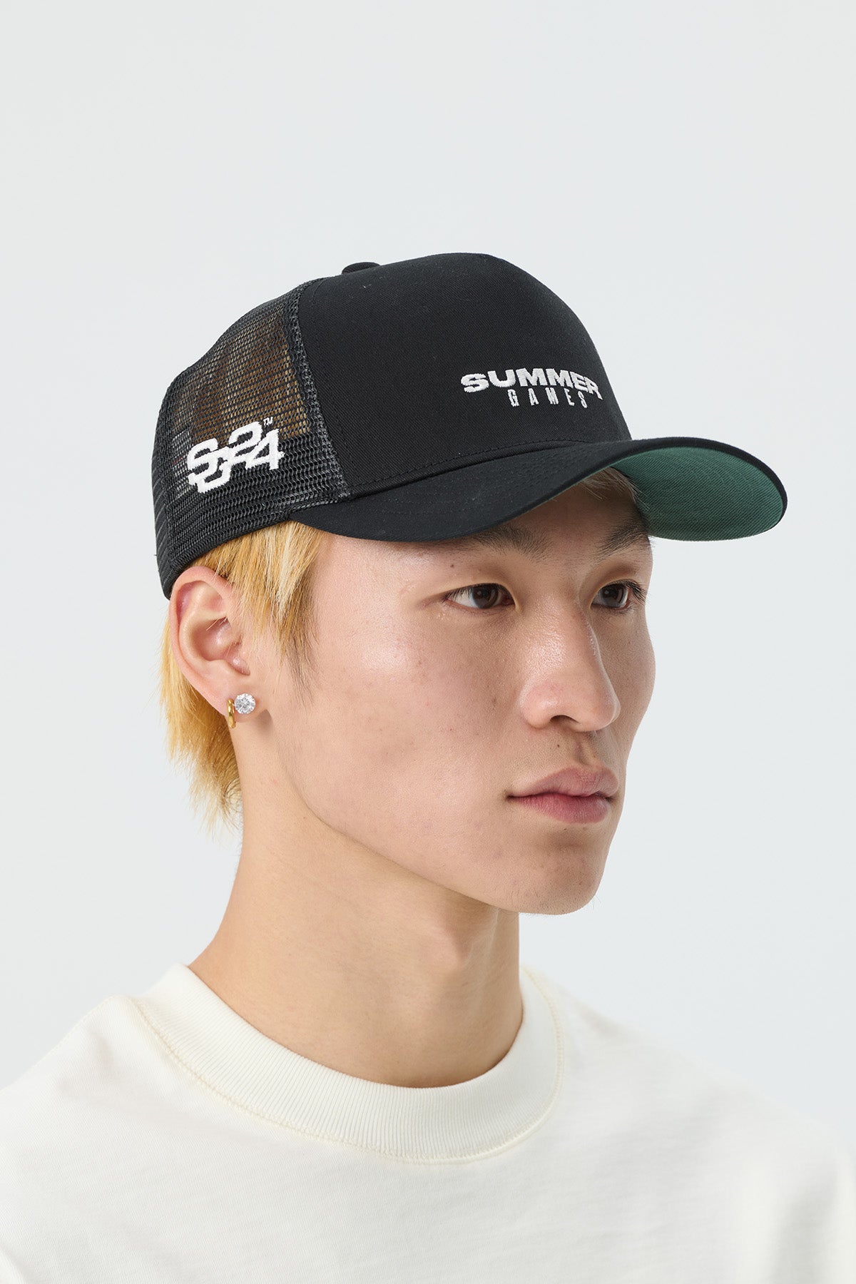 STACK LOGO TRUCKER CAP - JET BLACK